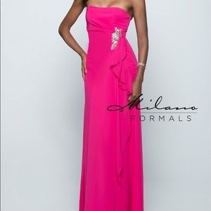 This dress is Fusha and runs small.